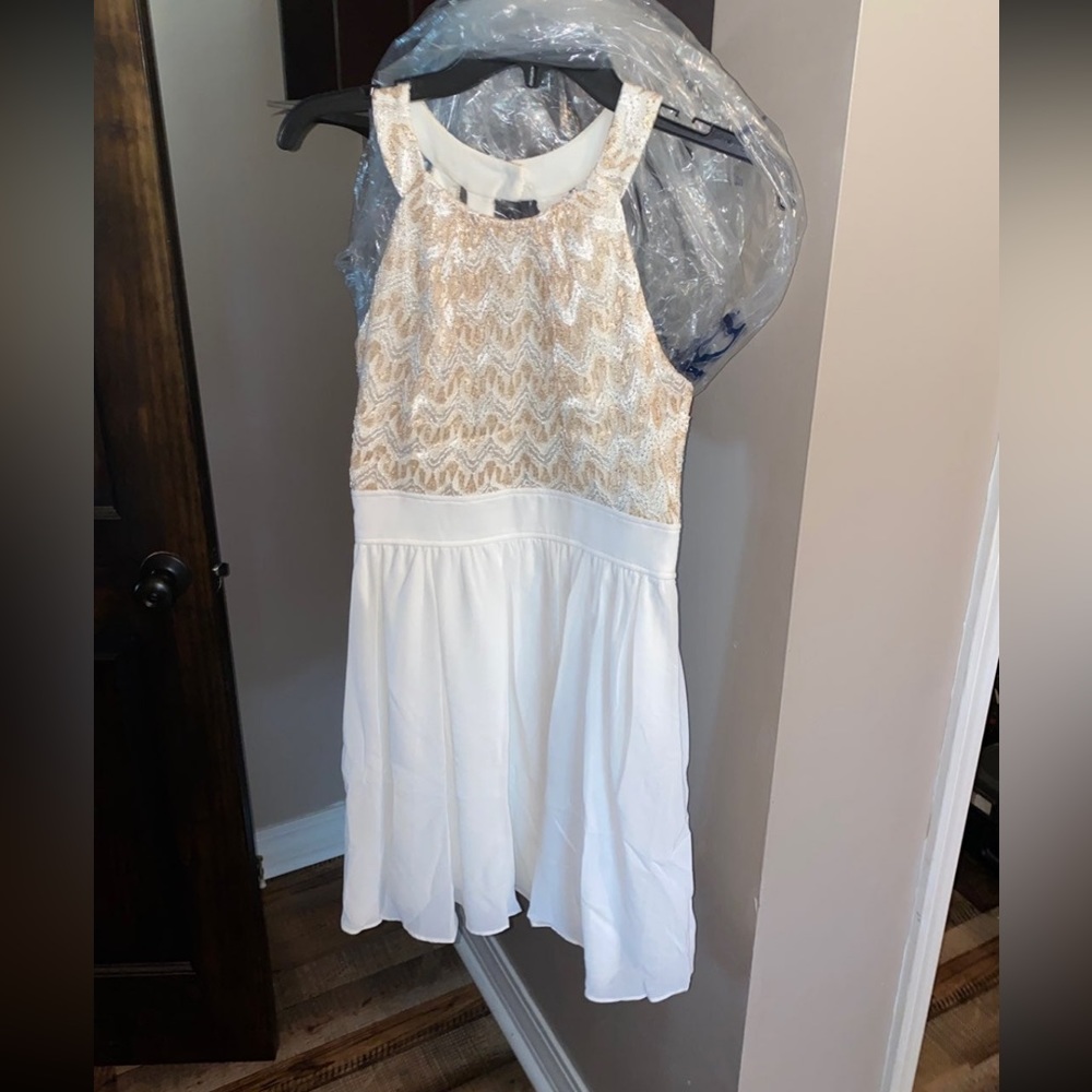 Little white dress with gold detailing from Dillards size 3.